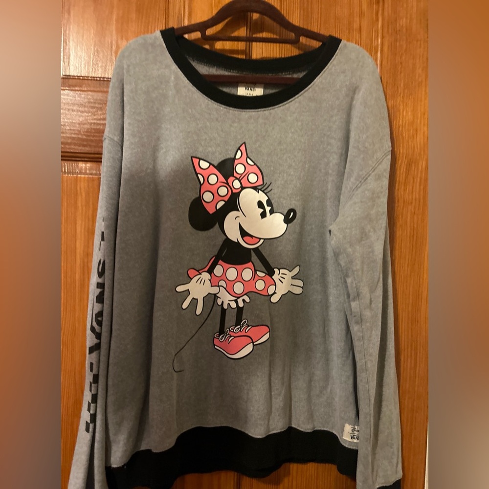 This long she’s sure it was bought at Disney and it is a Disney vans shirt